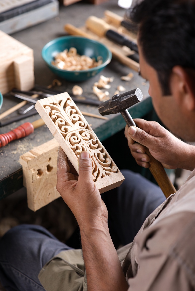 Artisan crafting handmade wall décor